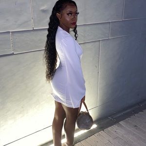 White v neck dress with high slit on the the thigh